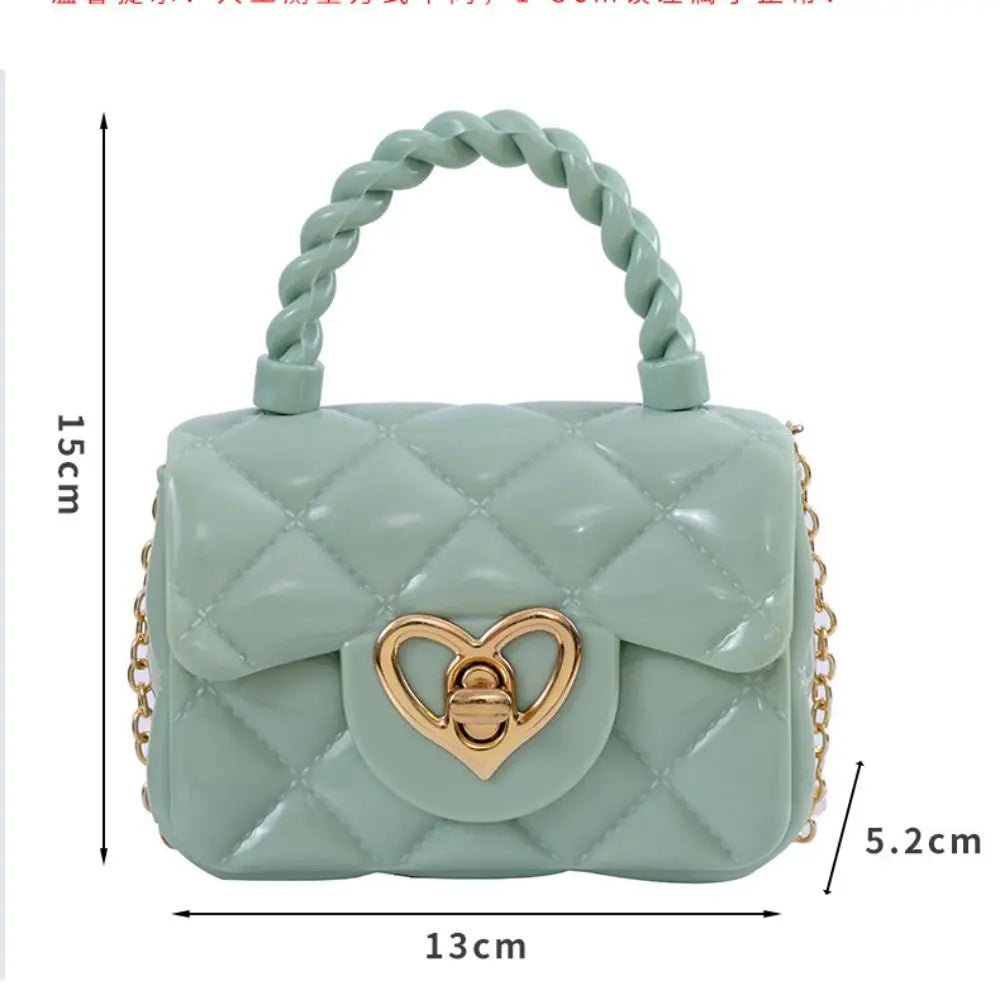 Kids quilted PU leather crossbody bag in mint green with braided handle and gold heart clasp, 13×15×5 cm