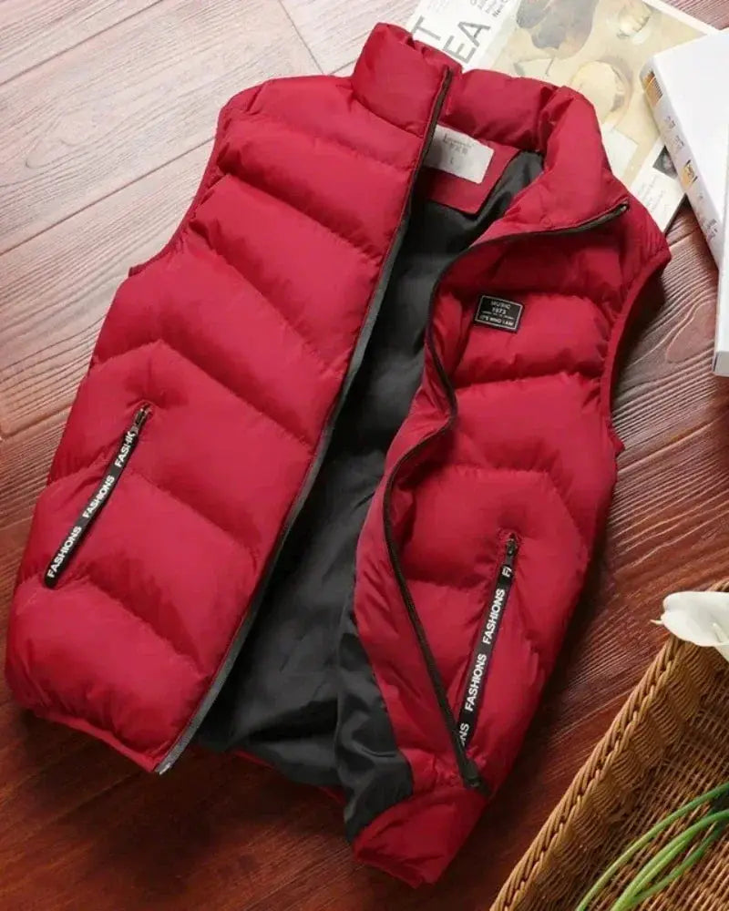 Men's red sleeveless down puffer vest with zip pockets by Simples Market