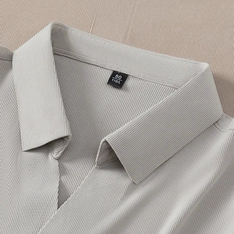 Men's polo shirt, light gray solid color, collared neckline close-up