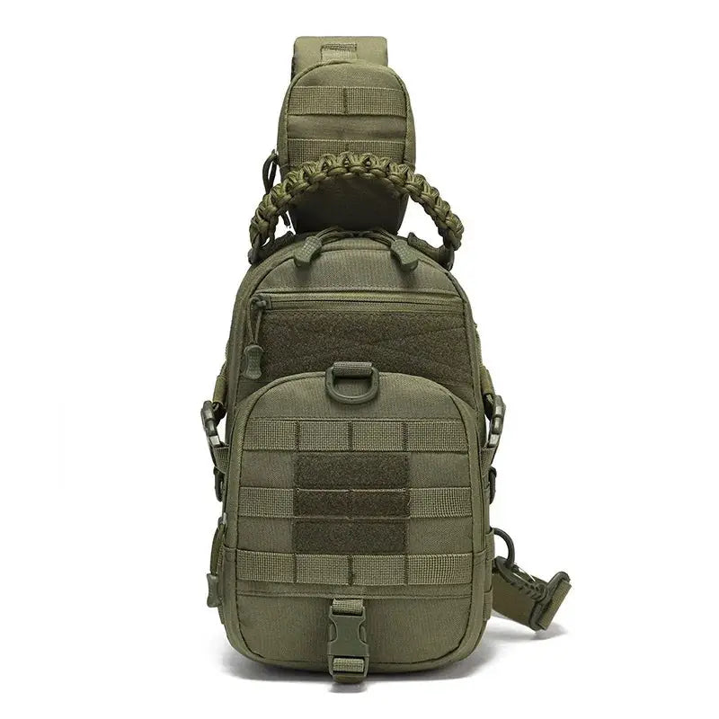 Tactical chest bag by Simples Market in olive green with MOLLE webbing, front zip pocket, handle, and compact sling design
