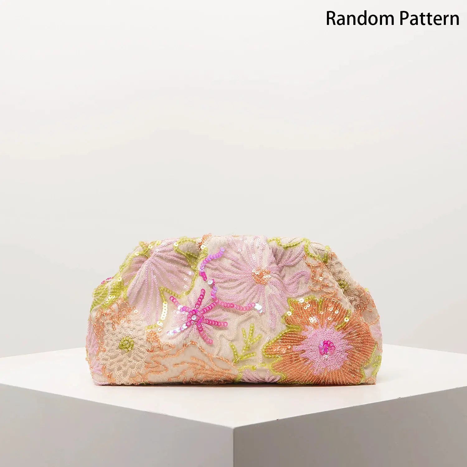 Clutch bag with pastel floral sequin embroidery on light fabric by Simples Market