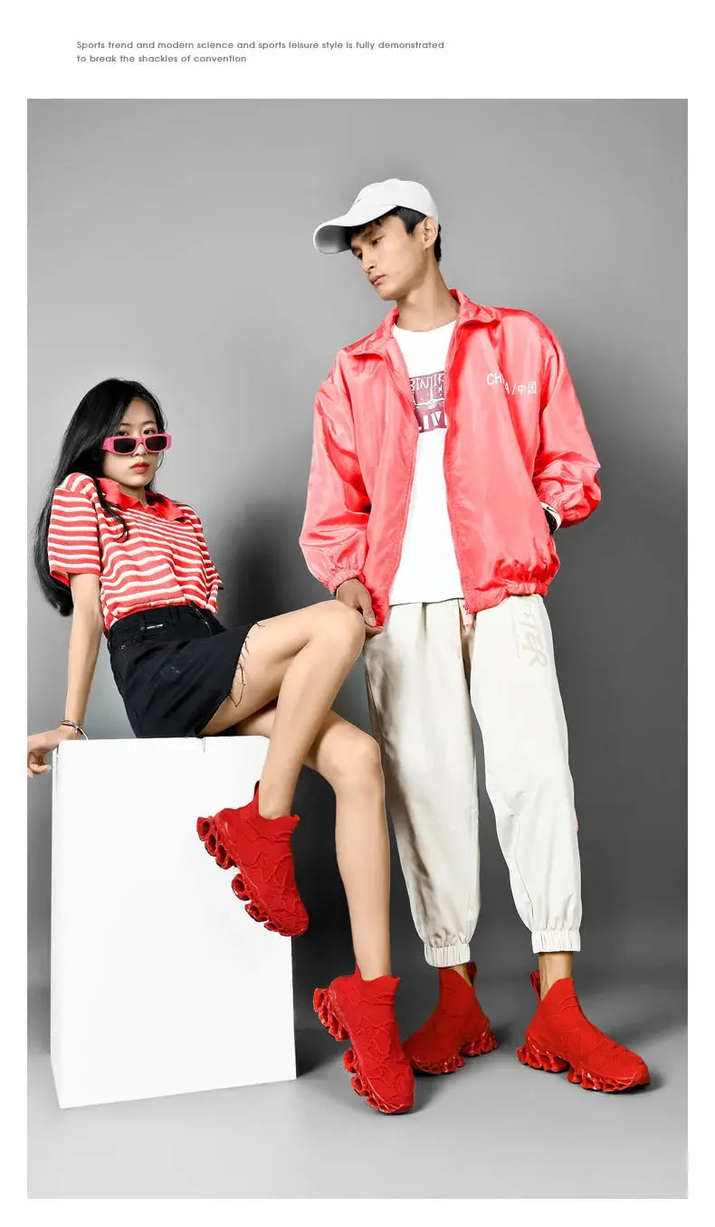 Red sock-style sneakers with a chunky bubble sole; two models in casual streetwear pose together.