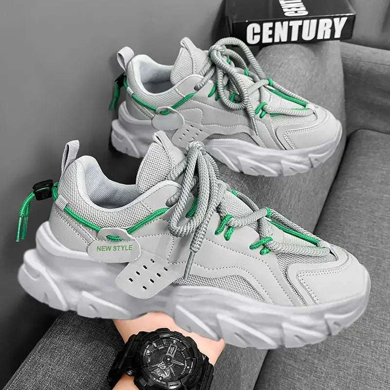 Men's sneakers with thick chunky sole, breathable gray mesh and green accents, pair