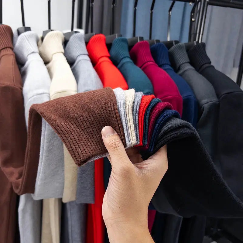 Men's knitted turtleneck sweater by Simples Market, slim fit anti-pilling pullover in multiple solid colors on rack