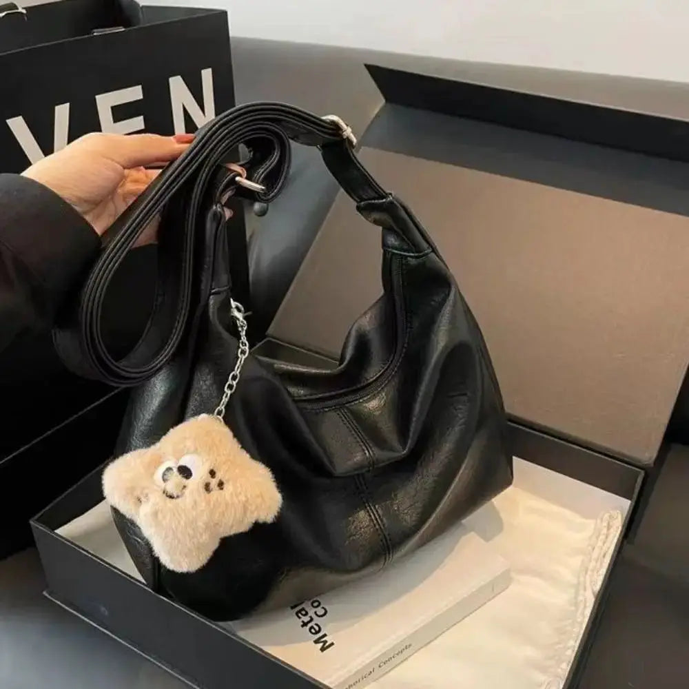 Trendy Slouchy Shoulder Bag for Women, black PU leather, large capacity with plush keychain