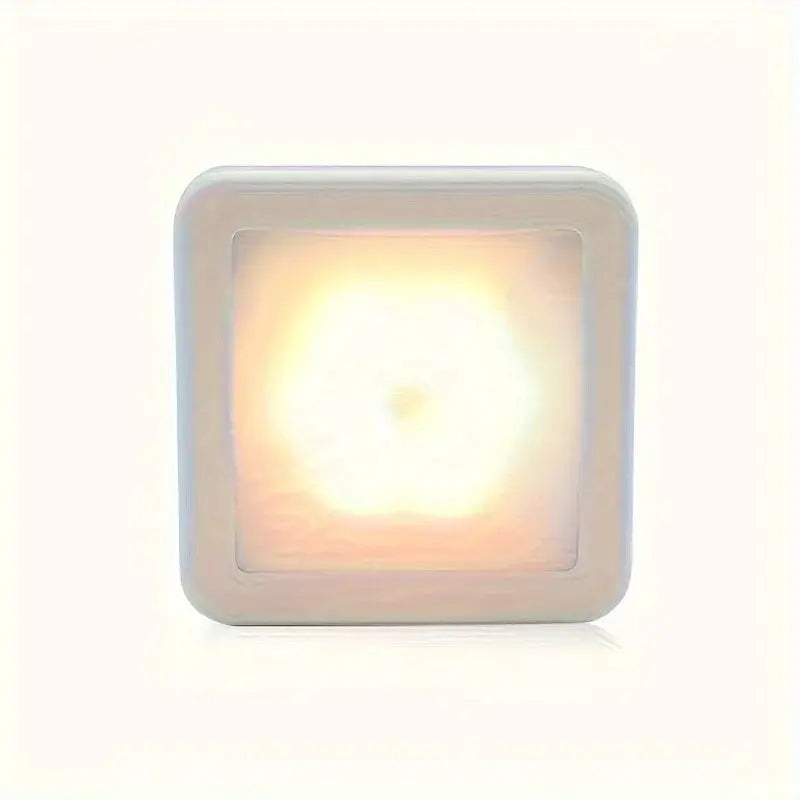 Motion sensor LED night light by Simples Market, white square wireless wall lamp with warm glow
