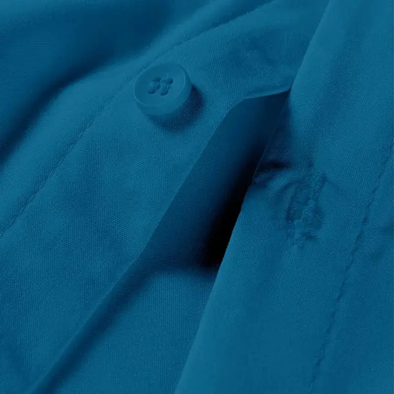 Men's blue solid-color business casual shirt with button detail
