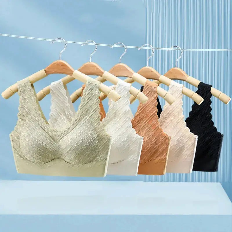 Seamless wireless sports bras in six colors hanging on wooden hangers