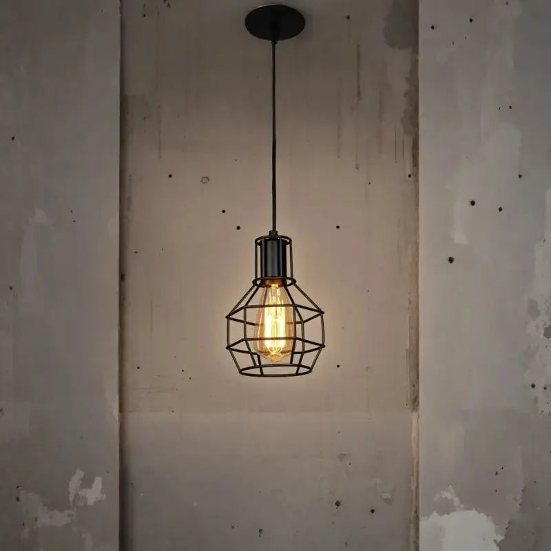 Industrial retro iron art pendant light with black metal cage and warm Edison bulb.