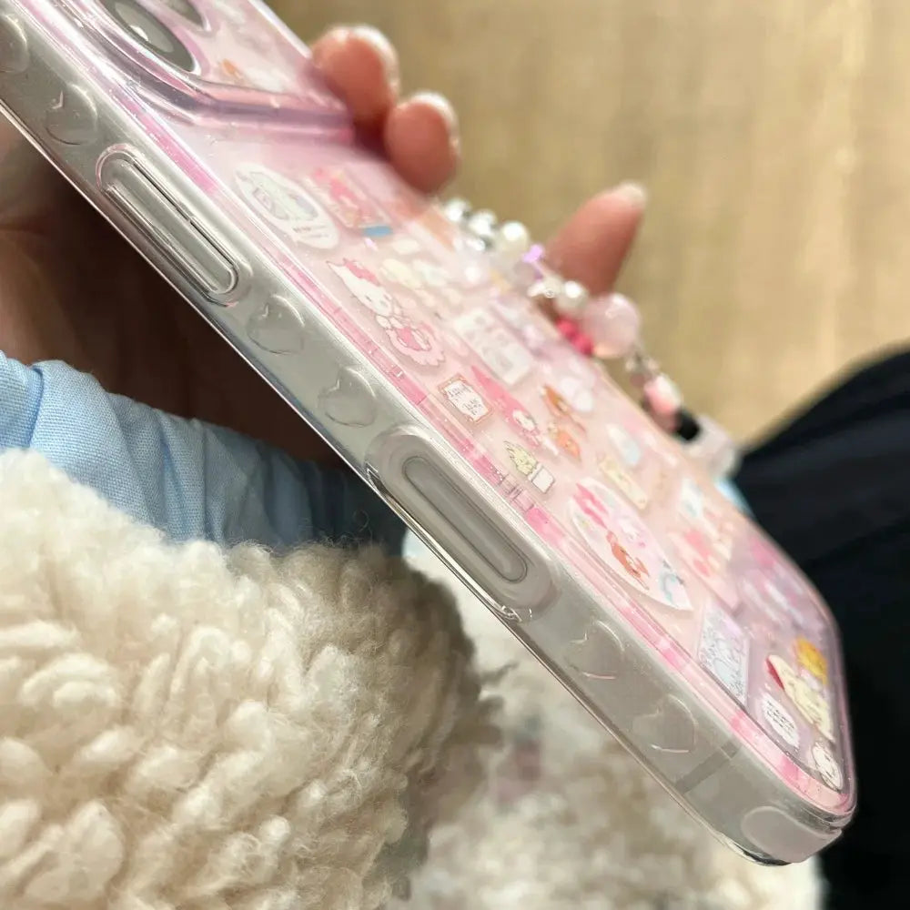 Pink Hello Kitty Melody cartoon phone case with pendant bracelet for iPhone 14–16 Pro Max, translucent back cover.