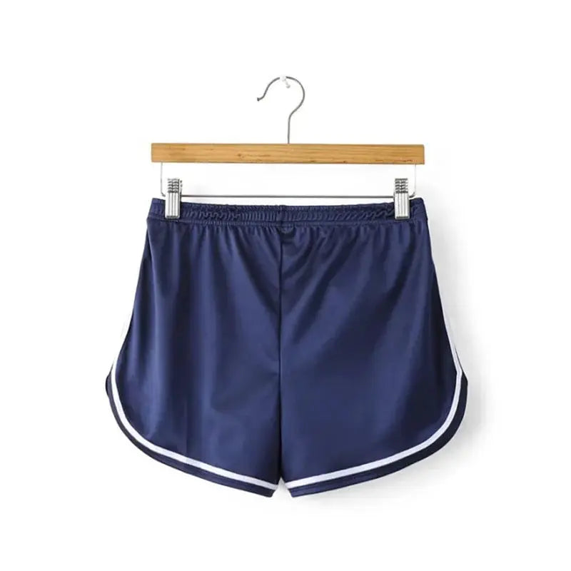 Women's silk-look navy shorts with white piping, elastic waistband, casual beachwear