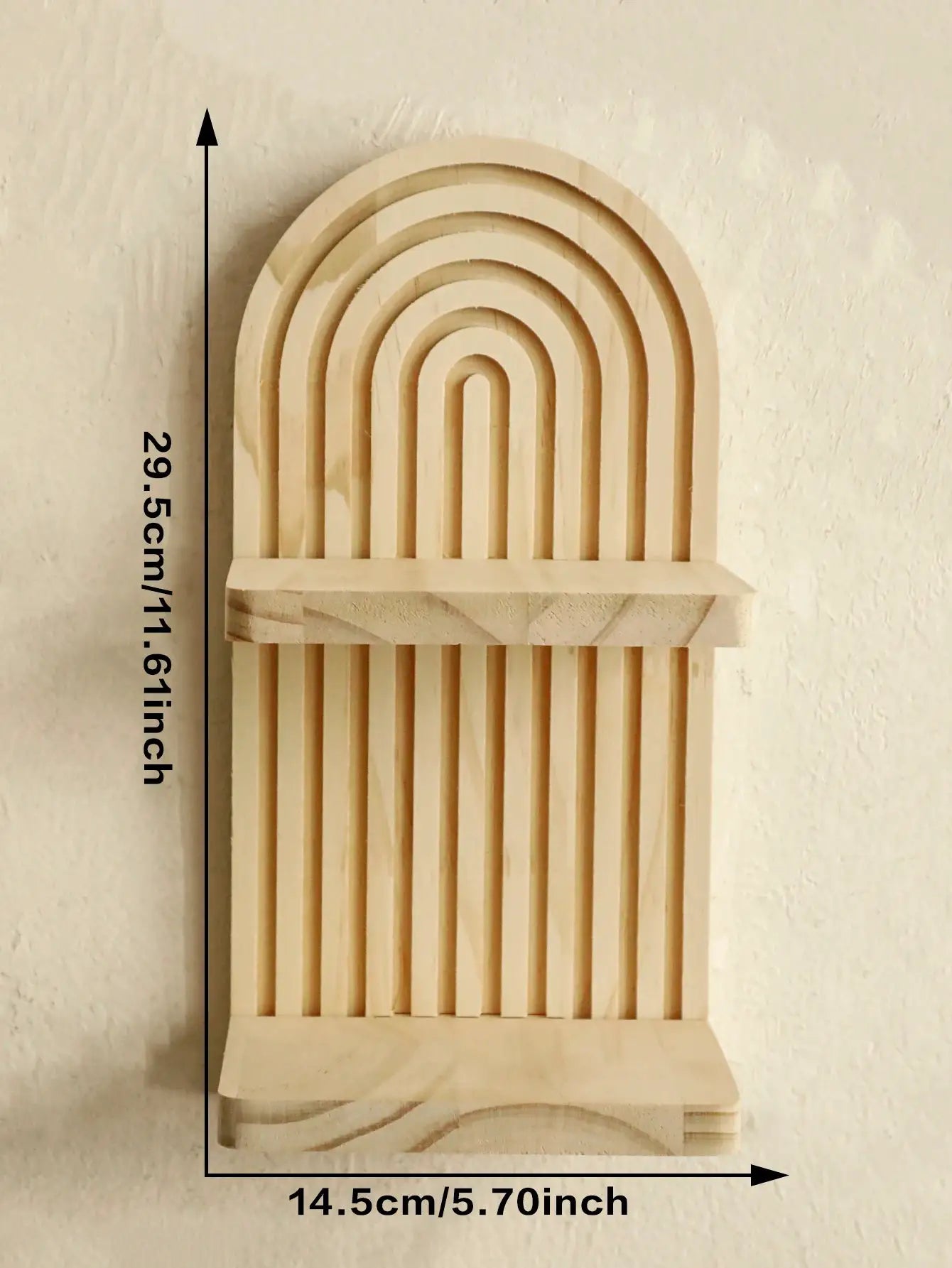 Boho-style wooden wall shelf with a natural wood finish and geometric arch design