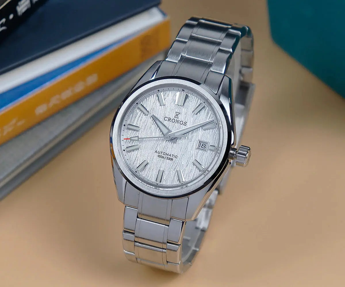 Cronos men's stainless steel 39mm automatic watch with a white birch-pattern dial, date window, solid links