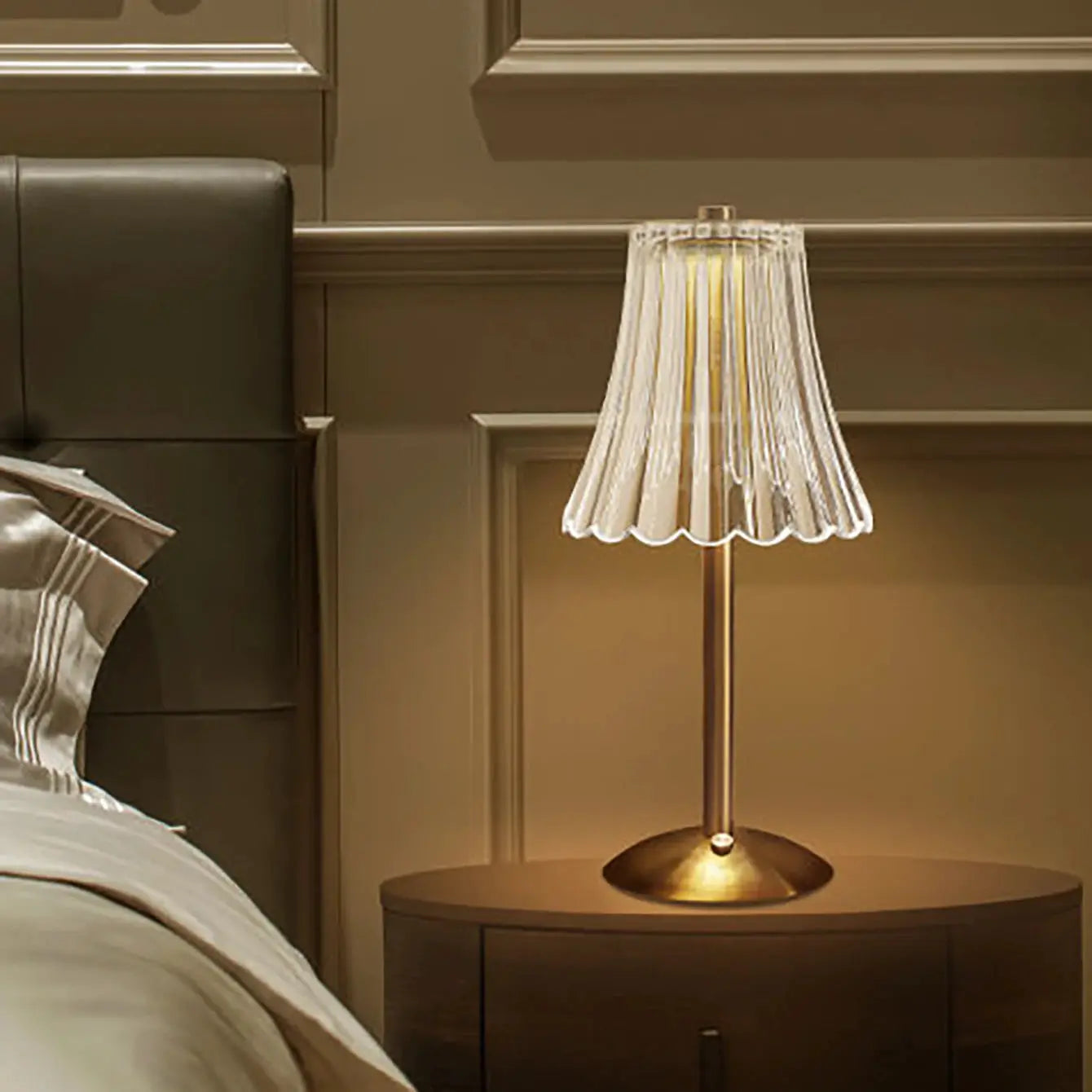 Crystal retro bedside table lamp with clear ribbed glass shade and brass base.