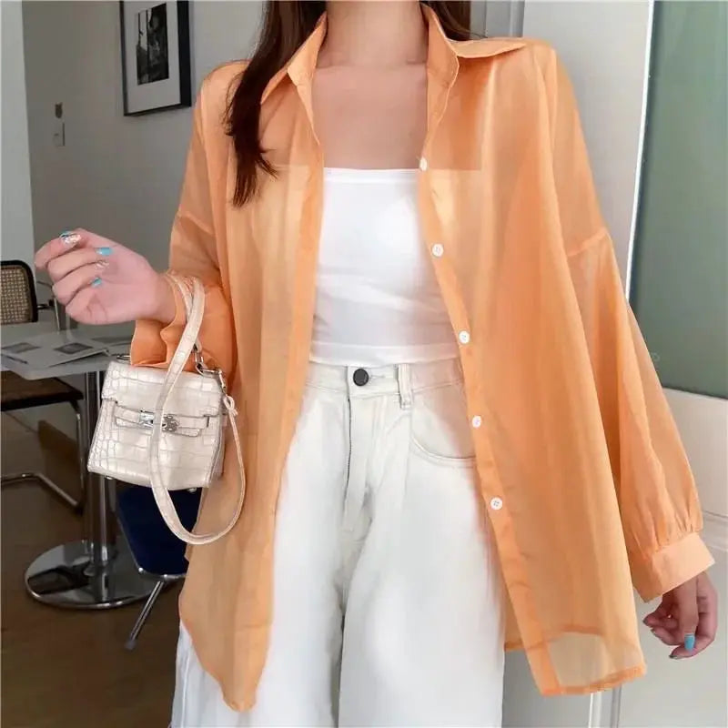 Peach sheer long-sleeve blouse over white top; casual loose-fit shirt by Simples Market