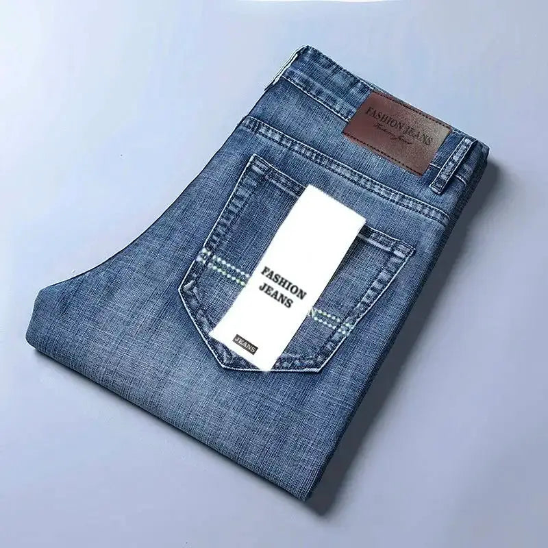 Men's blue denim jeans, straight-fit, folded with back pocket tag