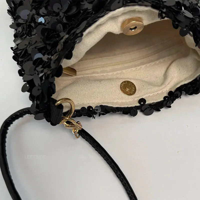 LEFTSIDE mini sequins shoulder bag by Simples Market, black sequined crossbody with beige lining and gold-tone hardware.