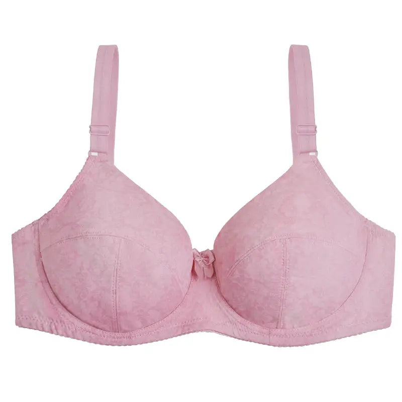 Simples Market pink lace bra with adjustable straps and a center bow.