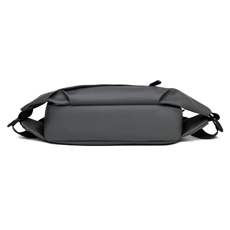 Men's minimalist waterproof waist bag in charcoal grey for outdoor running with crossbody design