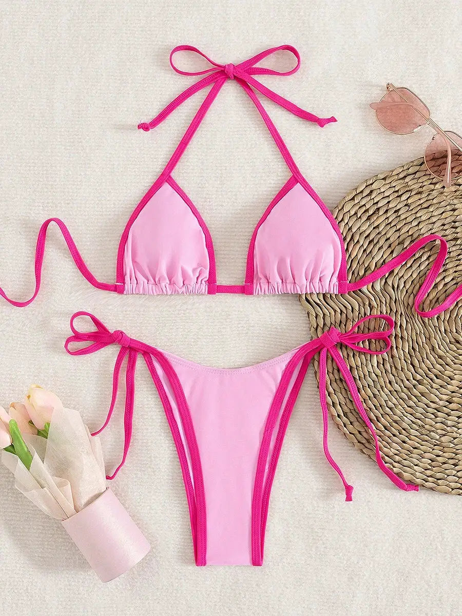 Pink two-piece bikini set with hot-pink trim; triangle top and thong-style bottom.