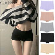 Women's seamless boxer briefs; black pair shown with five color options lavender, peach, gray, black, beige