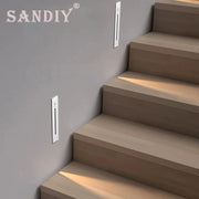 SANDY stair lighting wall lamps with motion sensors; two white recessed step lights by Simples Market (3W).