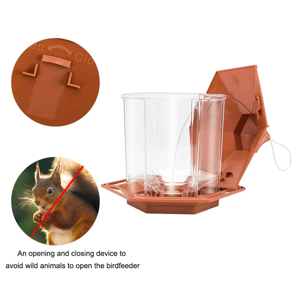 Simples Market automatic hanging bird feeder with clear plastic reservoir and orange-brown base; multi-hole feeding.