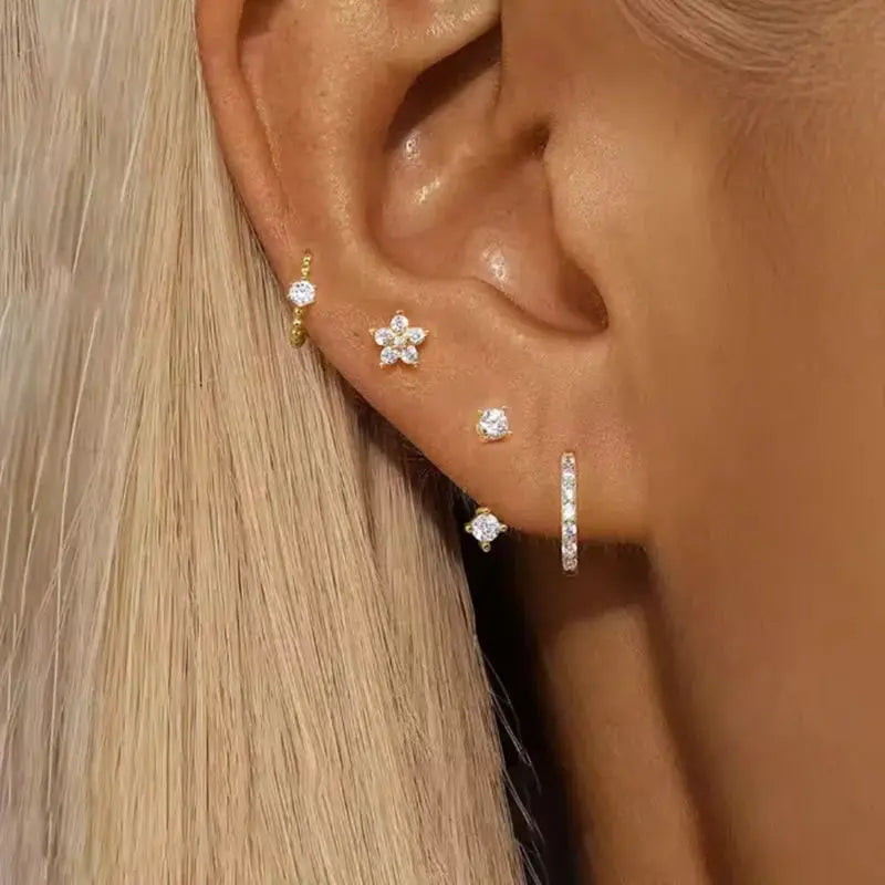 4pc zircon earring set for women featuring flower stud, round hoop and bar earrings in gold tone