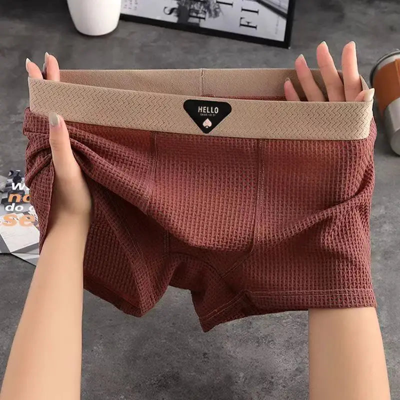 Men's boxer shorts in burgundy ice-silk fabric with beige elastic waistband and HELLO logo