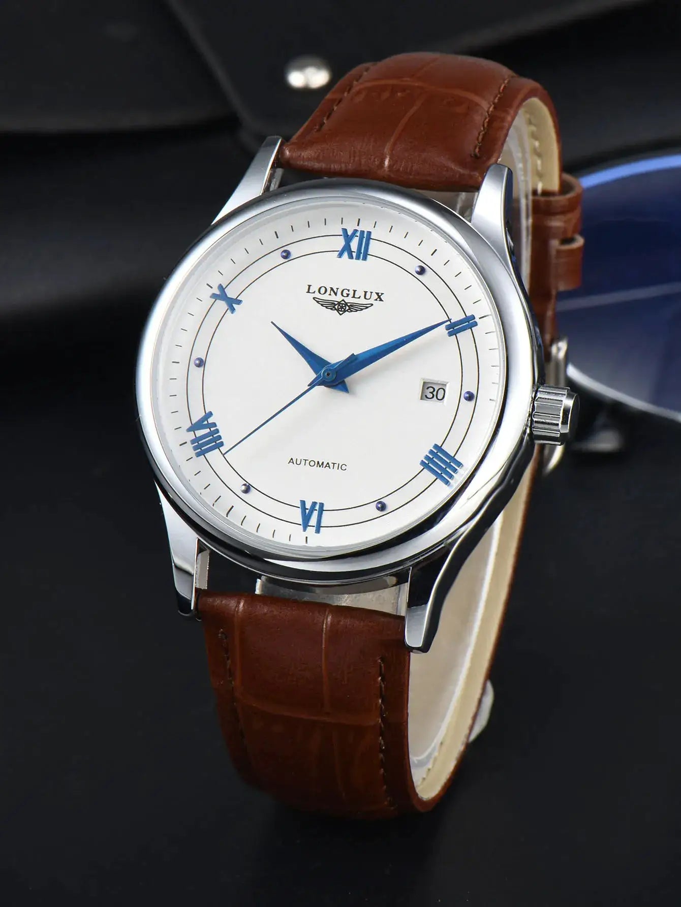 Longlux automatic men's wristwatch with white dial, blue Roman numerals and hands, date window, brown leather strap