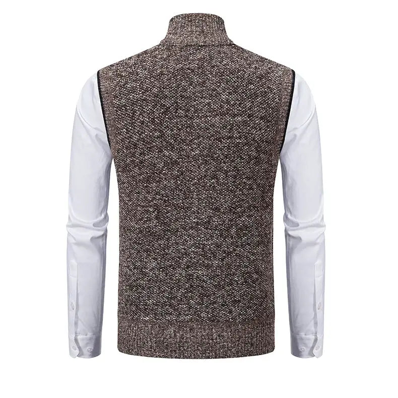 Men's brown speckled knit vest with stand collar worn over white shirt