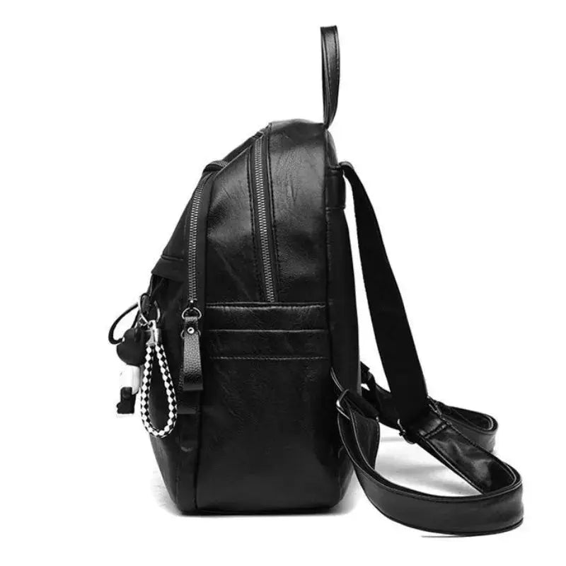 Backpack in black faux leather for women with multiple zip pockets and adjustable straps