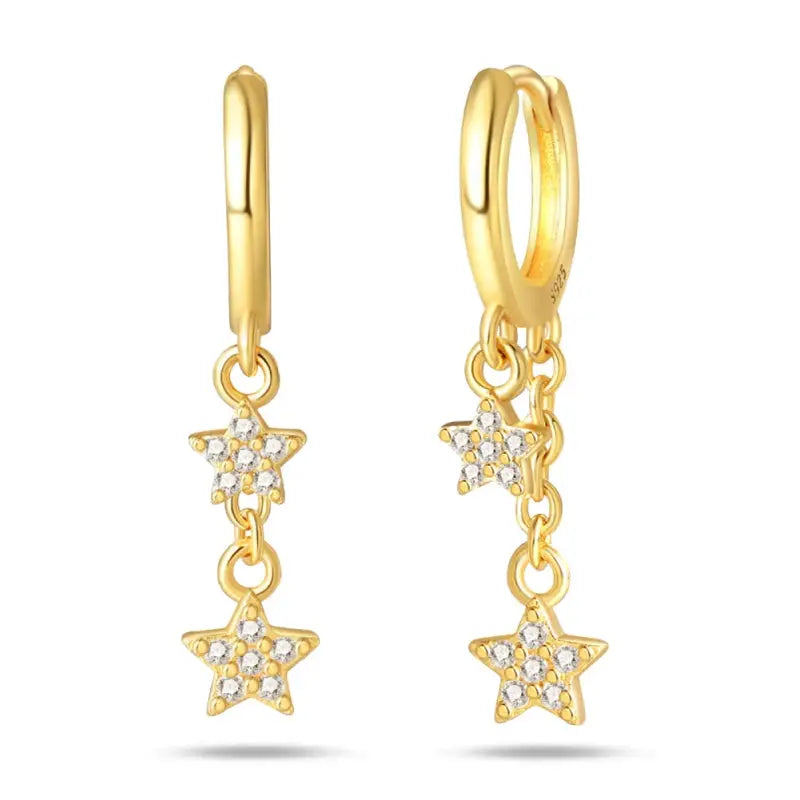 Gold-tone hoop earrings with two crystal-studded star charms on a dangling chain (pair).