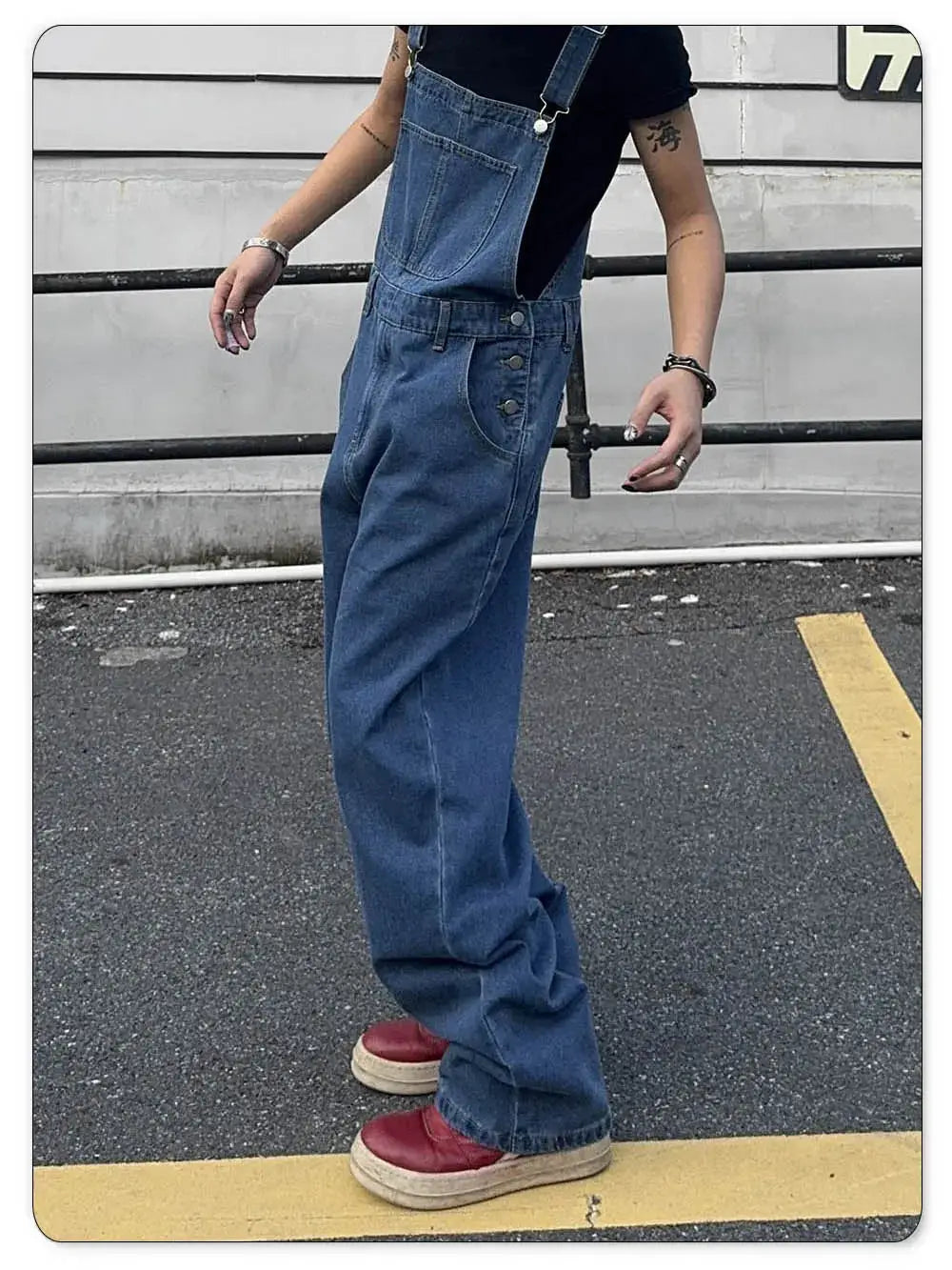 Men's blue denim overalls with suspenders, baggy loose fit, mid-waist, street casual jumpsuit style and red sneakers