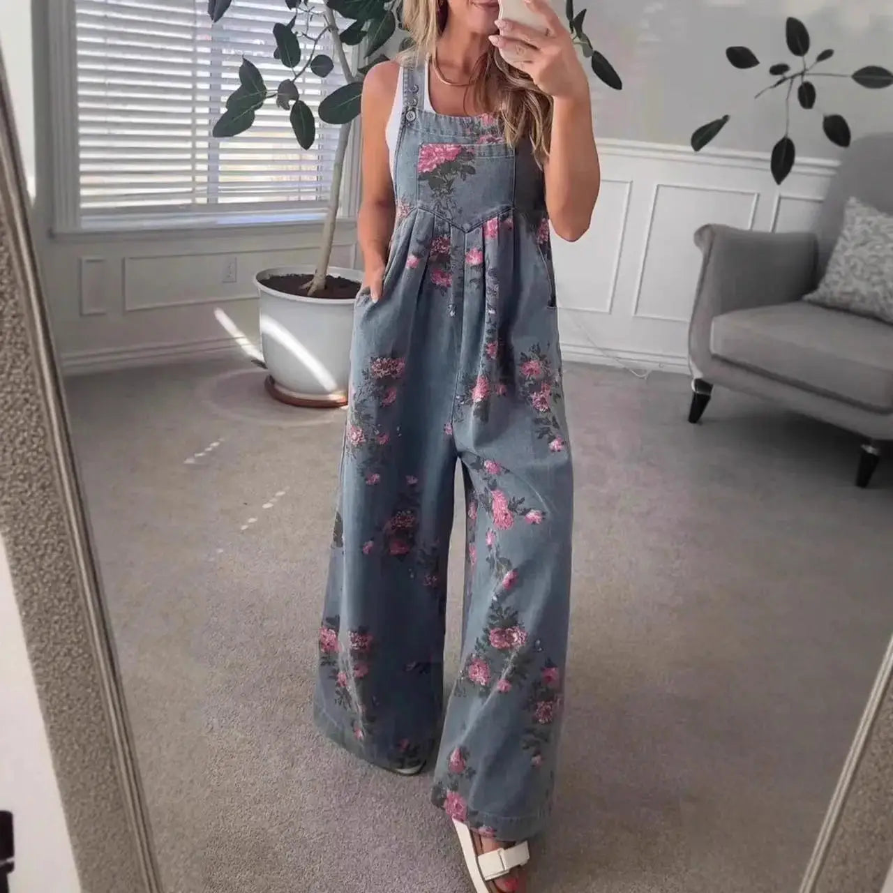 Denim floral print sleeveless jumpsuit for women by Simples Market with pockets and wide legs