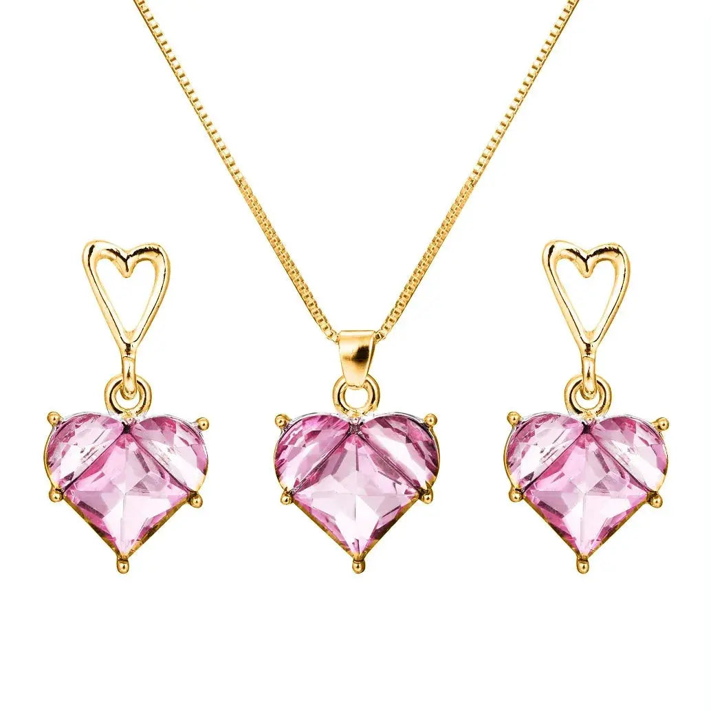 Peach heart necklace and earrings set in gold tone with pink crystal hearts