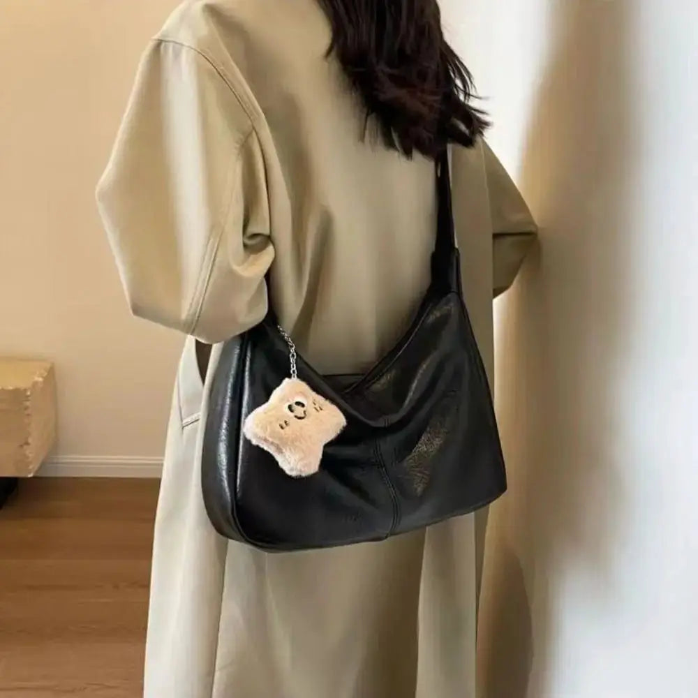 Slouchy shoulder bag by Simples Market in black PU leather, large-capacity hobo tote