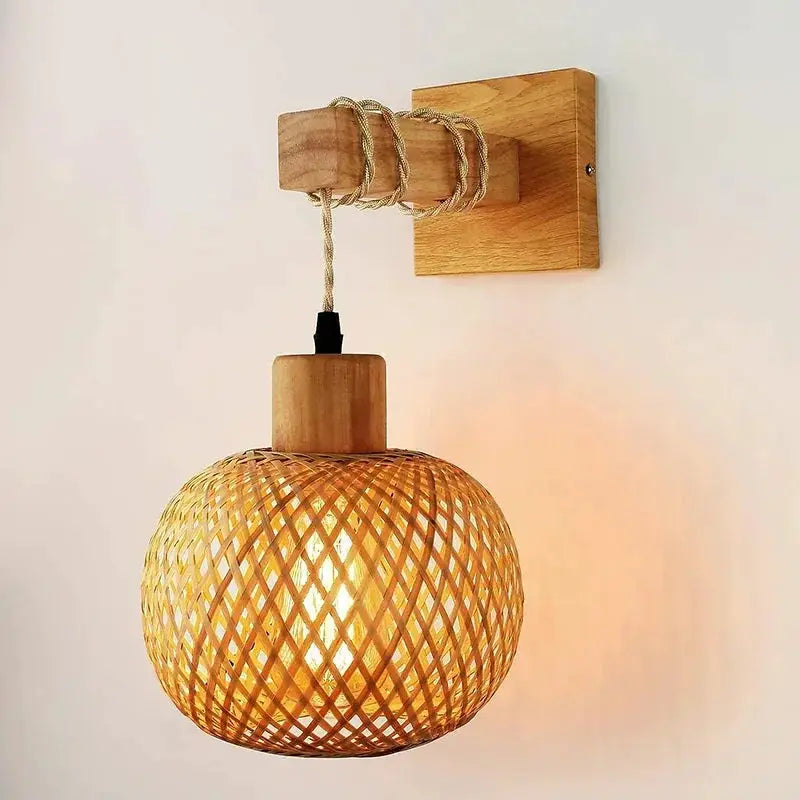 Simples Market bamboo lantern wall lamp, natural hand-woven rattan sphere with wooden wall mount.