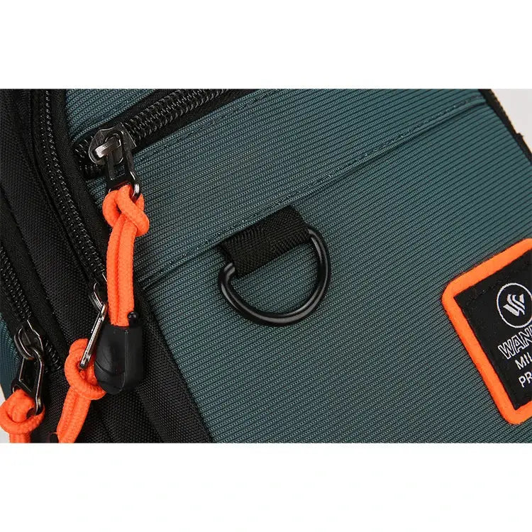 Men's outdoor hiking shoulder bag by Simples Market, teal fabric with orange paracord zipper pulls