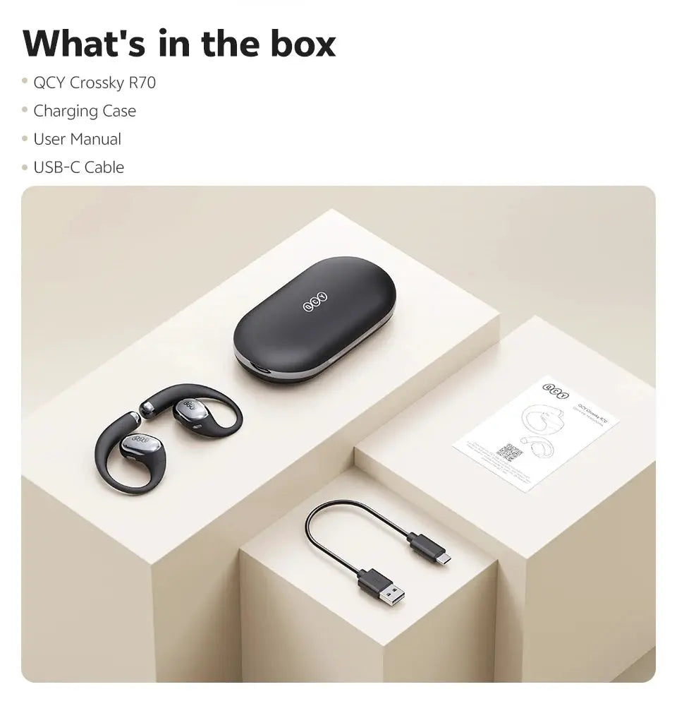 QCY Crossky R70 open-ear wireless headphones in black with charging case, USB-C cable, and user manual