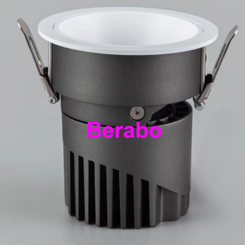 LED recessed downlight with white trim and black housing, spring clamps.