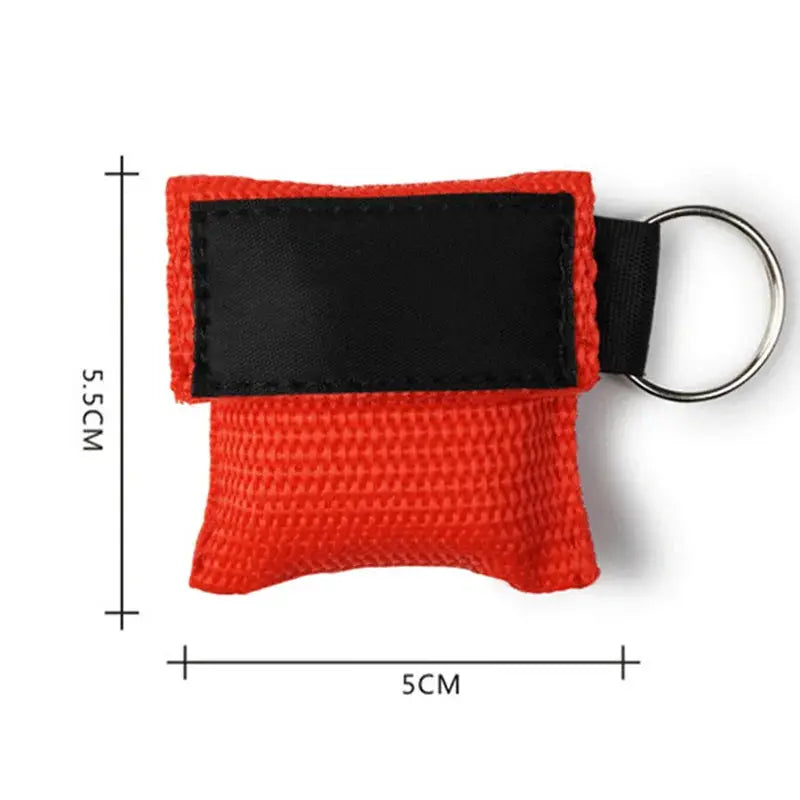 Keychain CPR face shield in red fabric pouch with black strap and metal key ring, Simples Market