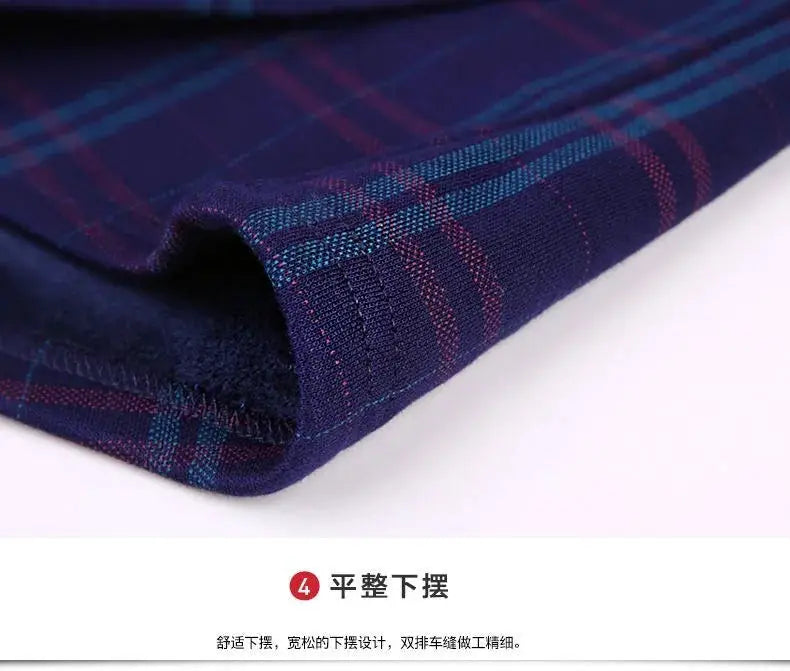 Men's plaid flannel shirt close-up in navy purple and blue check with soft inner fleece lining.