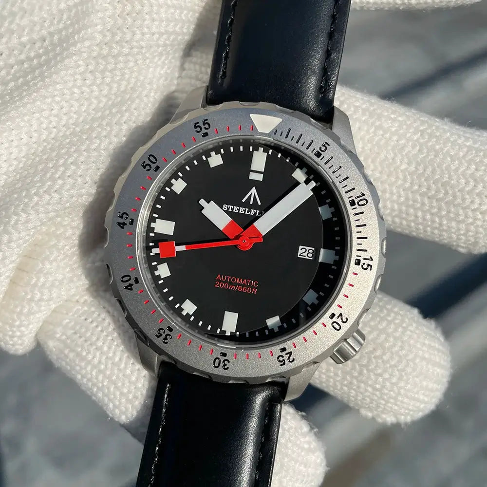 STEELFLIER SF752 dive watch with black dial, red accents, date window, leather strap
