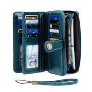 Teal oil-waxed leather RFID anti-theft long wallet with multiple card slots and zipped coin pouch.