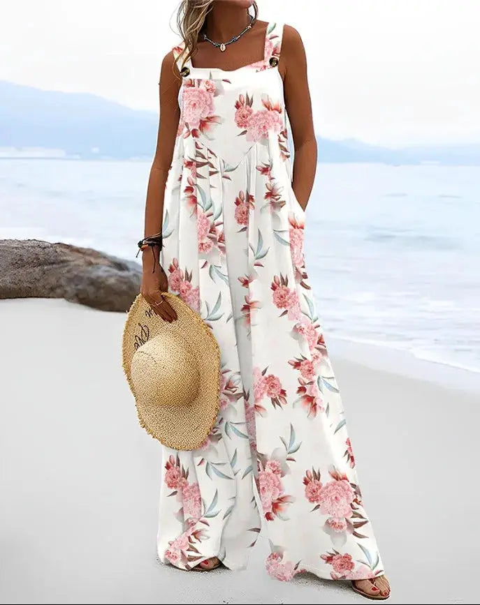 Jumpsuit with floral print, sleeveless, white base with pink flowers, loose wide-leg style