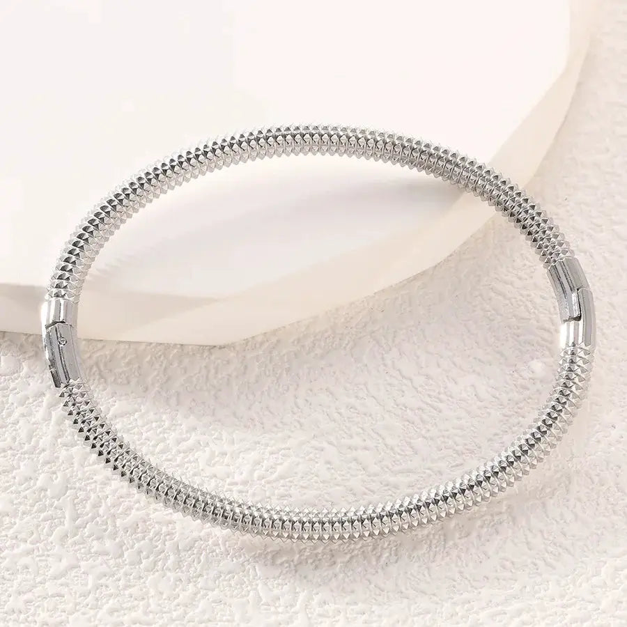 ZAKOL stainless steel cuff bracelet for women, silver-tone with textured beaded surface, openable