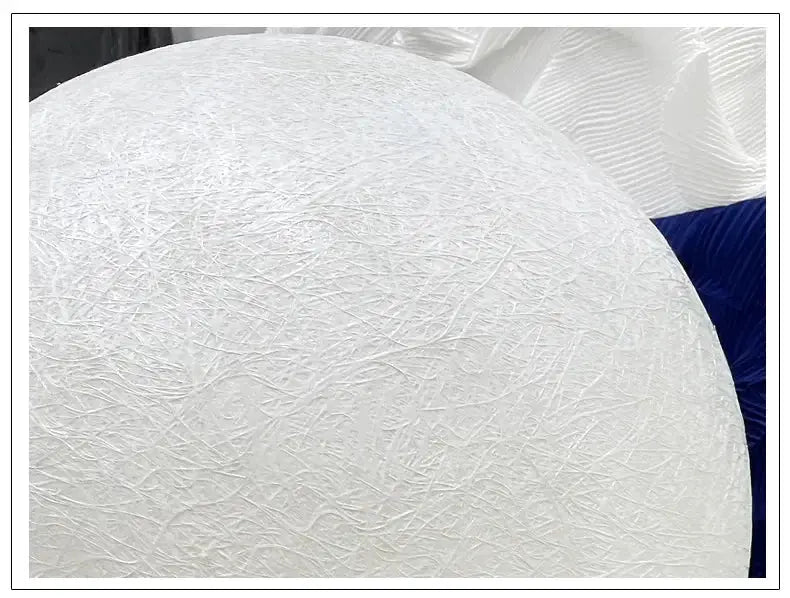 Nordic Moon LED pendant light, white textured sphere by Simples Market for living room decor