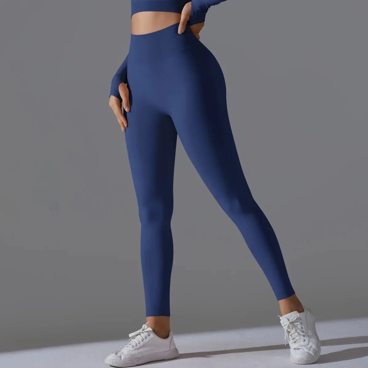 Women's seamless blue yoga leggings with high-waist tummy control and butt-lifting scrunch, Simples Market gym pants