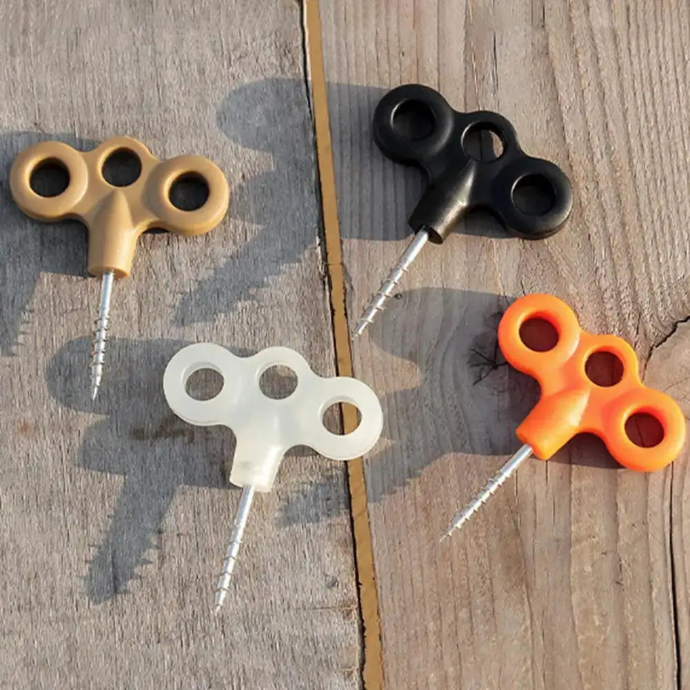 4-pack stainless steel ground anchors with screw spikes and plastic handles in tan, black, white, orange for camping